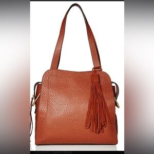 Vince Camuto Brown pebble leather with tassel.